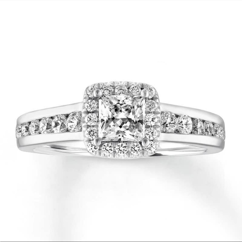 Solid 14k white gold ring. Size 7 princess cut halo. Good condition.
